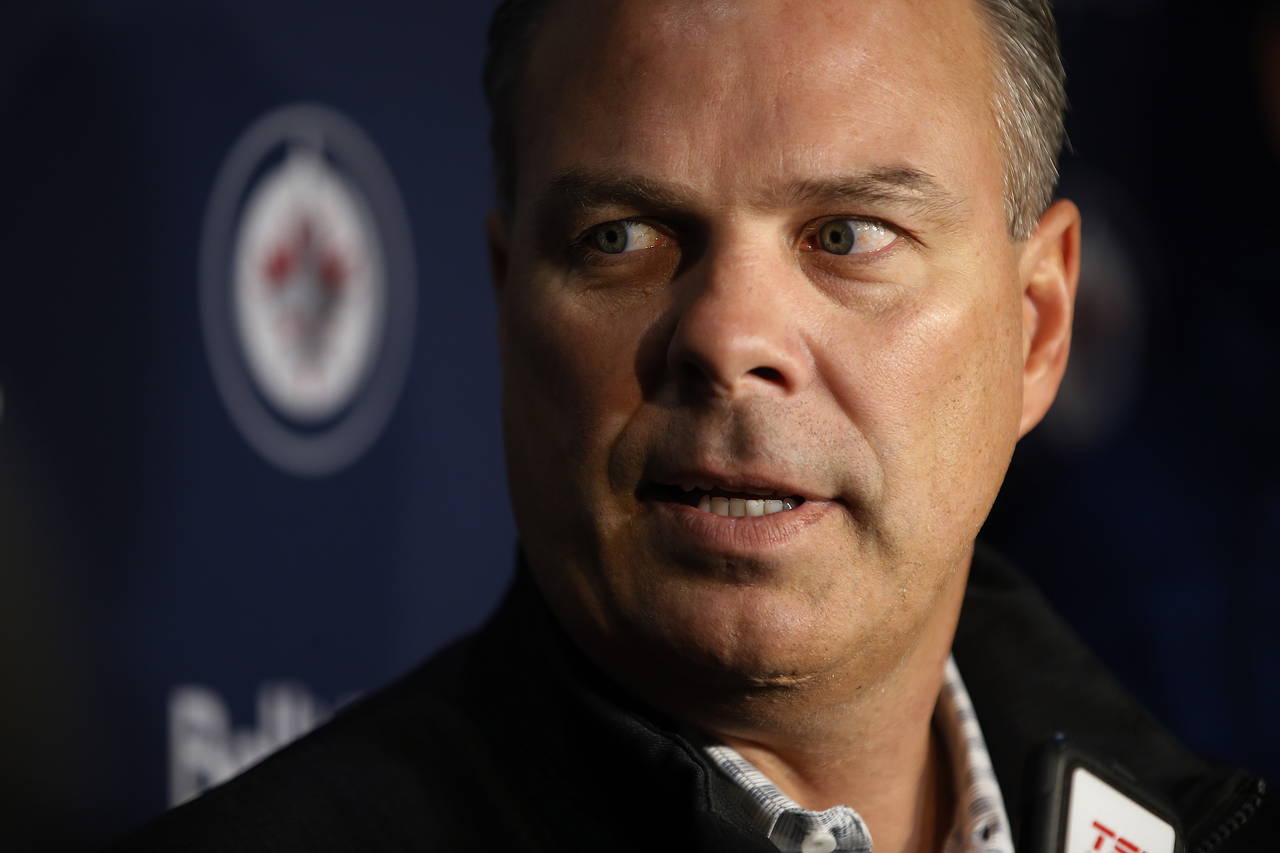 FILE - Winnipeg Jets general manager Kevin Cheveldayoff talks to media during the first day of the ...