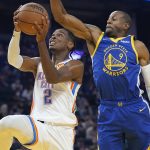 
              Oklahoma City Thunder guard Shai Gilgeous-Alexander (2) shoots in front of Golden State Warriors forward Andre Iguodala (9) during the first half of an NBA basketball game in San Francisco, Saturday, Oct. 30, 2021. (AP Photo/Jeff Chiu)
            