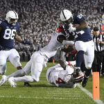 
              Penn State running back Keyvone Lee (24) is tackled by Indiana linebacker Cam Jones (4) in the first half of their NCAA college football game in State College, Pa., on Saturday, Oct. 2, 2021. (AP Photo/Barry Reeger)
            