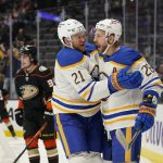 
              Buffalo Sabres' Zemgus Girgensons, right, is congratulated by Kyle Okposo after scoring a goal against the Anaheim Ducks during the first period of an NHL hockey game Thursday, Oct. 28, 2021, in Anaheim, Calif. (AP Photo/Jae C. Hong)
            