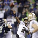 
              New Orleans Saints quarterback Jameis Winston (2) passes against the Seattle Seahawks during the second half of an NFL football game, Monday, Oct. 25, 2021, in Seattle. (AP Photo/John Froschauer)
            