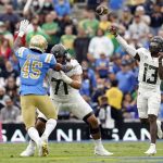 
              Oregon quarterback Anthony Brown (13) throws during the first half of an NCAA college football game against UCLA, Saturday, Oct. 23, 2021, in Pasadena, Calif. (AP Photo/Marcio Jose Sanchez)
            