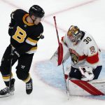 
              Boston Bruins' Taylor Hall (71) looks for the rebound off Florida Panthers' Spencer Knight (30) during the first period of an NHL hockey game, Saturday, Oct. 30, 2021, in Boston. (AP Photo/Michael Dwyer)
            