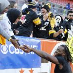 
              Pittsburgh Steelers running back Najee Harris celebrates with fans after the Steelers defeated the Cleveland Browns in an NFL football game, Sunday, Oct. 31, 2021, in Cleveland. (AP Photo/Ron Schwane)
            