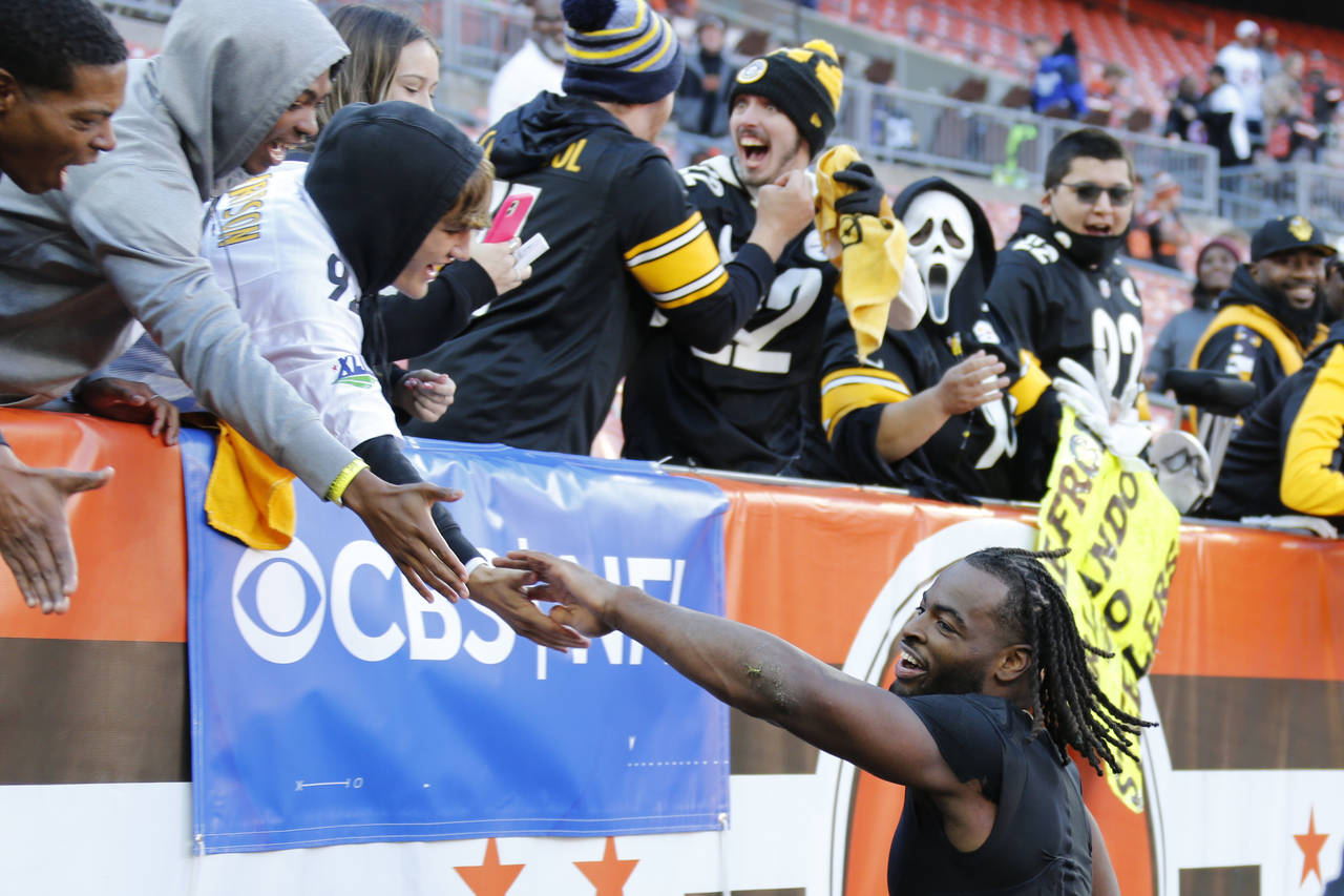 Pittsburgh Steelers running back Najee Harris celebrates with fans after the Steelers defeated the ...
