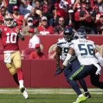 
              San Francisco 49ers quarterback Jimmy Garoppolo (10) passes against the Seattle Seahawks during the first half of an NFL football game in Santa Clara, Calif., Sunday, Oct. 3, 2021. (AP Photo/Tony Avelar)
            
