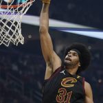
              Cleveland Cavaliers' Jarrett Allen dunks against the Atlanta Hawks in the first half of an NBA basketball game, Saturday, Oct. 23, 2021, in Cleveland. (AP Photo/Tony Dejak)
            
