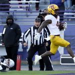 
              Minnesota running back Mar'Keise Irving, right, scores a touchdown past Northwestern linebacker Chris Bergin and defensive back Coco Azema during the second half of an NCAA college football game in Evanston, Ill., Saturday, Oct. 30, 2021. (AP Photo/Nam Y. Huh)
            
