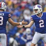 
              Buffalo Bills kicker Tyler Bass (2) celebrates a 33-yard field goal with Matt Haack (3) during the first half of an NFL football game against the Houston Texans, Sunday, Oct. 3, 2021, in Orchard Park, N.Y. (AP Photo/Adrian Kraus)
            