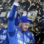 
              Kyle Larson celebrates after winning a NASCAR Cup Series auto race at Kansas Speedway in Kansas City, Kan., Sunday, Oct. 24, 2021. (AP Photo/Colin E. Braley)
            