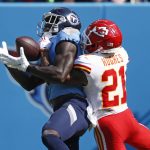 
              Tennessee Titans wide receiver A.J. Brown, left, catches a touchdown pass as he is defended by Kansas City Chiefs cornerback Mike Hughes (21) in the first half of an NFL football game Sunday, Oct. 24, 2021, in Nashville, Tenn. (AP Photo/Wade Payne)
            