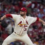 
              St. Louis Cardinals starting pitcher Jon Lester throws during the first inning of a baseball game against the Chicago Cubs Saturday, Oct. 2, 2021, in St. Louis. (AP Photo/Jeff Roberson)
            