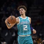 
              Charlotte Hornets guard LaMelo Ball (2) brings the ball up court during the first half of an NBA basketball game against Portland Trail Blazers, Sunday, Oct. 31, 2021, in Charlotte, N.C. (AP Photo/Matt Kelley)
            
