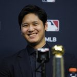 
              Shohei Ohtani wins the Commissioner's Historic Achievement Award from Rob Manfred before Game 1 in baseball's World Series between the Houston Astros and the Atlanta Braves Tuesday, Oct. 26, 2021, in Houston. (AP Photo/Ashley Landis)
            