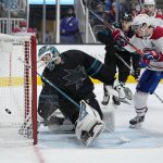 
              Montreal Canadiens right wing Brendan Gallagher (11) scores a goal past San Jose Sharks goaltender Adin Hill (33) during the second period of an NHL hockey game Thursday, Oct. 28, 2021, in San Jose, Calif. (AP Photo/Tony Avelar)
            