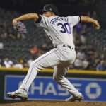 
              Colorado Rockies pitcher Julian Fernández (30) delivers against the Arizona Diamondbacks during the seventh inning of a baseball game Saturday, Oct 2, 2021, in Phoenix. (AP Photo/Darryl Webb)
            