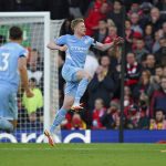 
              Manchester City's Kevin De Bruyne celebrates scoring his side's second goal , during the English Premier League soccer match between Liverpool and Manchester City at Anfield, Liverpool, England, Sunday Oct. 3, 2021. (Peter Byrne/PA via AP)
            