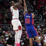 
              Chicago Bulls forward DeMar DeRozan, left, shoots over Detroit Pistons guard Cory Joseph during the first half of an NBA basketball game in Chicago, Saturday, Oct. 23, 2021. (AP Photo/Nam Y. Huh)
            