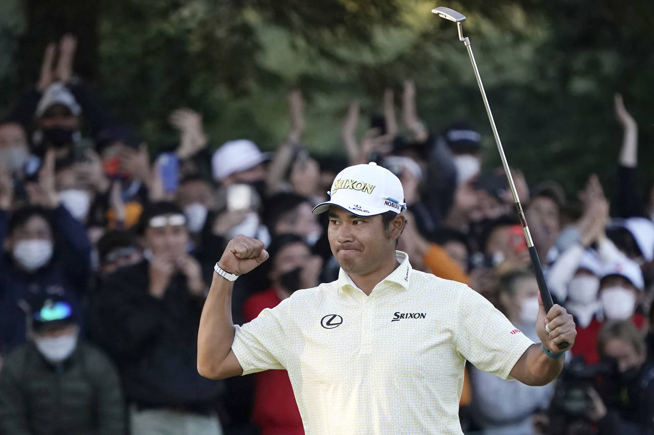 Hideki Matsuyama of Japan gestures after winning the final round of the Zozo Championship golf tour...
