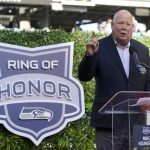 
              Former Seattle Seahawks coach Mike Holmgren speaks after being introduced as the newest member of the team's Ring of Honor during halftime in an NFL football game against the Jacksonville Jaguars, Sunday, Oct. 31, 2021, in Seattle. (AP Photo/Ted S. Warren)
            