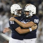 
              Penn State place kicker Jordan Stout (98) celebrates with Chris Stoll (91) after kicking a 50-yard field goal in the fourth quarter of their NCAA college football game in State College, Pa., on Saturday, Oct. 2, 2021. Penn State defeated Indiana 24-0. (AP Photo/Barry Reeger)
            