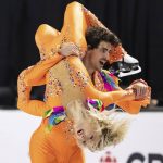 
              Canada's Piper Gilles and Paul Poirier perform their ice dance rhythm dance routine during the Skate Canada figure skating competition in Vancouver, British Columbia, Friday, Oct. 29, 2021. (Darryl Dyck/The Canadian Press via AP)
            