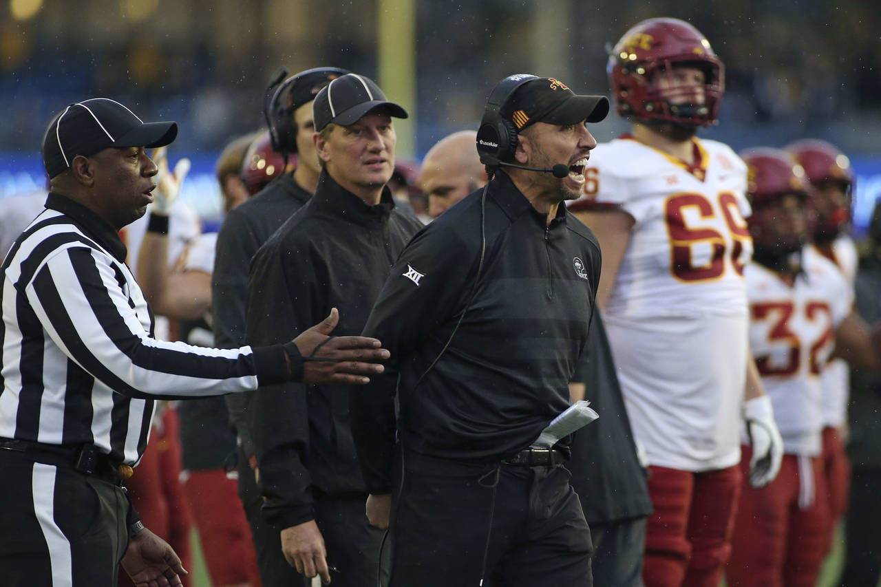 Iowa state coach Matt Campbell reacts after watching a fumble playback during the second half of an...