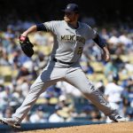 
              Milwaukee Brewers starting pitcher Brett Anderson throws to a Los Angeles Dodgers batter during the first inning of a baseball game in Los Angeles, Sunday, Oct. 3, 2021. (AP Photo/Alex Gallardo)
            