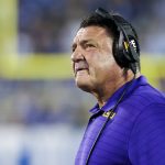
              LSU coach Ed Orgeron looks up at the video board during the first half of the tealm's NCAA college football game against Kentucky in Lexington, Ky., Saturday, Oct. 9, 2021. (AP Photo/Michael Clubb)
            