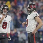
              Tampa Bay Buccaneers kicker Ryan Succop, right, smiles as he celebrates with holder Bradley Pinion (8) after making a field goal late in the fourth quarter of an NFL football game against the New England Patriots, Sunday, Oct. 3, 2021, in Foxborough, Mass. (AP Photo/Steven Senne)
            