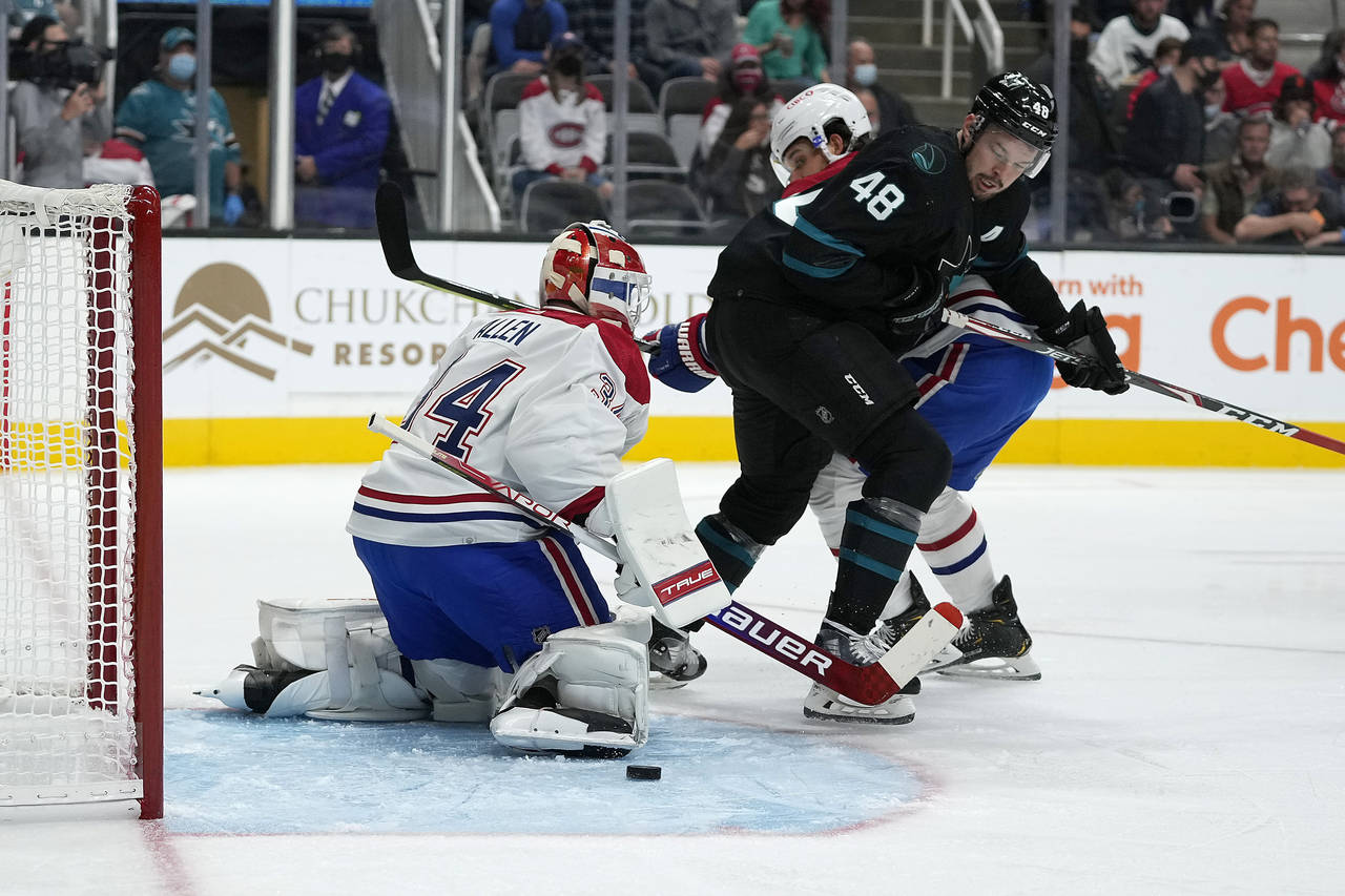Montreal Canadiens goaltender Jake Allen (34) blocks a shot as San Jose Sharks center Tomas Hertl (...