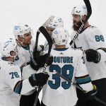 
              San Jose Sharks' Timo Meier, behind, celebrates his goal with teammates Jonathan Dahlen (76), Mario Ferraro (38), Logan Couture (39) and Brent Burns (88) during the third period of an NHL hockey game against the Boston Bruins, Sunday, Oct. 24, 2021, in Boston. (AP Photo/Michael Dwyer)
            