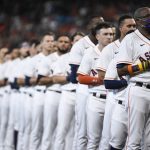 
              Houston Astros manager Dusty Baker Jr., right, stands with his team as they listen to the national anthem before Game 1 of a baseball American League Division Series against the Chicago White Sox Thursday, Oct. 7, 2021, in Houston. (AP Photo/Eric Christian Smith)
            