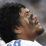 
              Detroit Lions offensive tackle Penei Sewell reacts on the sidelines during the second half of an NFL football game against the Los Angeles Rams Sunday, Oct. 24, 2021, in Inglewood, Calif. (AP Photo/Kevork Djansezian)
            