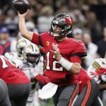 
              Tampa Bay Buccaneers quarterback Tom Brady (12) passes in the first half of an NFL football game against the New Orleans Saints in New Orleans, Sunday, Oct. 31, 2021. (AP Photo/Butch Dill)
            