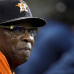 
              Houston Astros manager Dusty Baker Jr. watches during the fourth inning in Game 2 of baseball's American League Championship Series against the Boston Red Sox Saturday, Oct. 16, 2021, in Houston. (AP Photo/David J. Phillip)
            