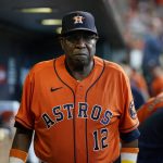 
              Houston Astros manager Dusty Baker Jr. (12) walks through the dugout during the seventh inning in Game 2 of a baseball American League Division Series against the Chicago White Sox Friday, Oct. 8, 2021, in Houston. (AP Photo/David J. Phillip)
            