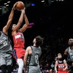 
              Brooklyn Nets' Nic Claxton (33) blocks a shot by Washington Wizards' Spencer Dinwiddie (26) during the first half of an NBA basketball game Monday, Oct. 25, 2021, in New York. (AP Photo/Frank Franklin II)
            