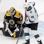 
              Boston Bruins' Linus Ullmark (35) deflects a shot in front of San Jose Sharks' Jasper Weatherby (26) during the first period of an NHL hockey game, Sunday, Oct. 24, 2021, in Boston. (AP Photo/Michael Dwyer)
            
