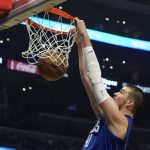 
              Los Angeles Clippers center Ivica Zubac dunks against the Portland Trail Blazers during the first half of an NBA basketball game Monday, Oct. 25, 2021, in Los Angeles. (AP Photo/Marcio Jose Sanchez)
            