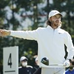 
              Tommy Fleetwood of England gestures after his tee shot on the fourth hole during the final round of the Zozo Championship golf tournament at Accordia Golf Narashino Country Club on Sunday, Oct. 24, 2021, in Inzai, Chiba Prefecture, Japan. (AP Photo/Tomohiro Ohsumi)
            
