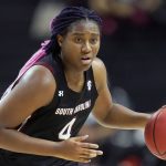 
              FILE - South Carolina forward Aliyah Boston (4) brings the ball down against Texas A&M during the first half of an NCAA college basketball game in College Station, Texas, in this Sunday, Feb. 28, 2021, file photo. Boston was named to the preseason Associated Press NCAA college basketball All-America team on Tuesday, Oct. 26, 2021.(AP Photo/Sam Craft, File)
            