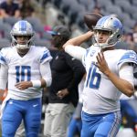 
              Detroit Lions quarterback Jared Goff (16) warms up before an NFL football game against the Chicago Bears Sunday, Oct. 3, 2021, in Chicago. (AP Photo/David Banks)
            