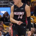
              Miami Heat guard Tyler Herro (14) reacts after being fouled during the first half of the team's NBA basketball game against the Indiana Pacers in Indianapolis, Saturday, Oct. 23, 2021. (AP Photo/Doug McSchooler)
            