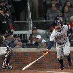 
              Houston Astros' Jose Altuve watches his home run during the fourth inning in Game 4 of baseball's World Series between the Houston Astros and the Atlanta Braves Saturday, Oct. 30, 2021, in Atlanta. (AP Photo/David J. Phillip)
            
