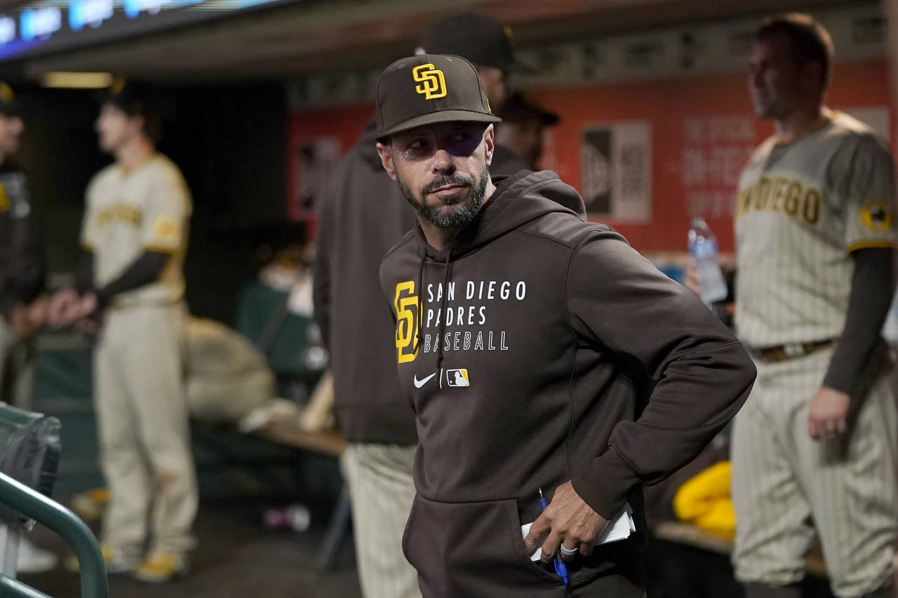 San Diego Padres manager Jayce Tingler stands in the dugout during the eighth inning of his team's ...