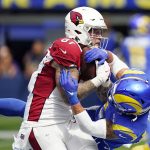 
              Arizona Cardinals tight end Maxx Williams, left, catches a touchdown next to Los Angeles Rams safety Taylor Rapp during the first half in an NFL football game Sunday, Oct. 3, 2021, in Inglewood, Calif. (AP Photo/Jae C. Hong)
            