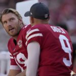 
              San Francisco 49ers' Mitch Wishnowsky, left, talks with kicker Robbie Gould (9) during the second half of an NFL football game against the Seattle Seahawks in Santa Clara, Calif., Sunday, Oct. 3, 2021. (AP Photo/Tony Avelar)
            