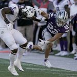 
              TCU linebacker Jamoi Hodge (6) breaks up a pass intended for Kansas State running back Deuce Vaughn (22) during the second half of an NCAA college football game, Saturday, Oct. 30, 2021, in Manhattan, Kan. (AP Photo/Charlie Riedel)
            