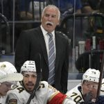 
              Florida Panthers coach Joel Quenneville calls out instructions during the third period of the team's preseason NHL hockey game against the Tampa Bay Lightning, Thursday, Oct. 7, 2021, in Tampa, Fla. (AP Photo/Phelan M. Ebenhack)
            